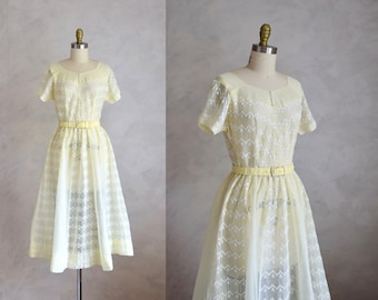 vintage 1950s pale yellow fit and flare dress | 50s  vintage full skirt dress | short sleeve embroidered sun dress in soft yellow