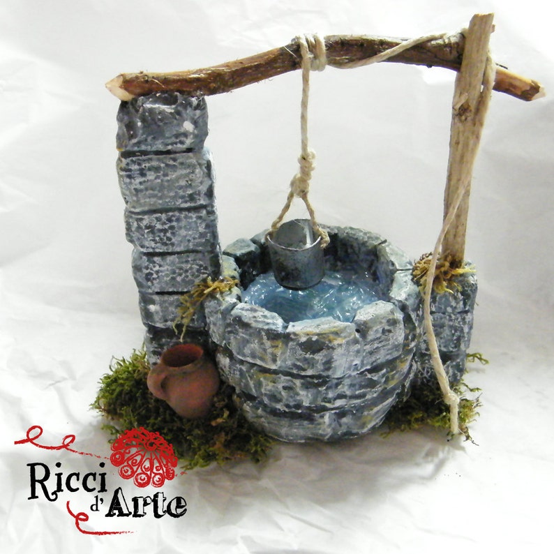 Miniature pit crib and dollhouse