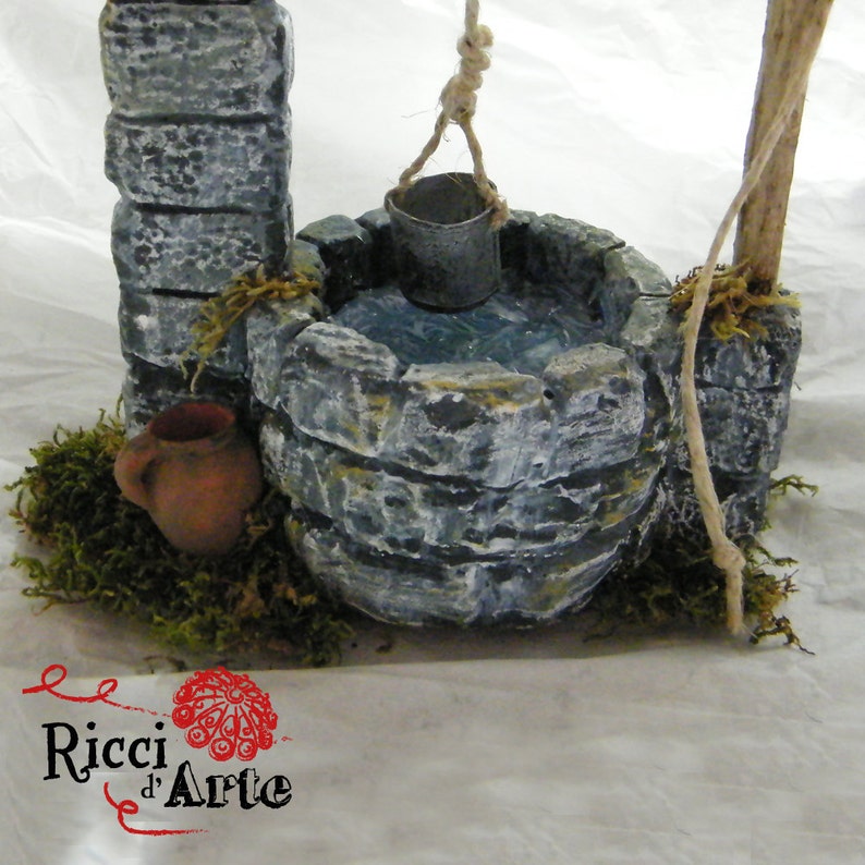 Miniature pit crib and dollhouse