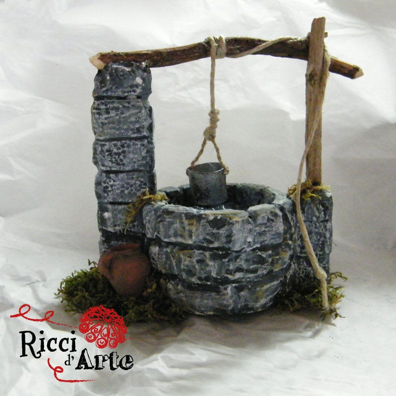 Miniature pit crib and dollhouse