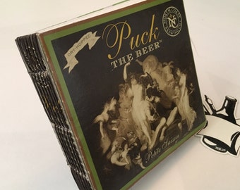 Upcycled sketchbook made from a North Coast Brewing Puck the Beer box