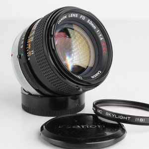Vintage CANON Lens FD 50mm f/1.4 S.S.C.  - In Great Condition - Caps and UV Filter Included- Sharp