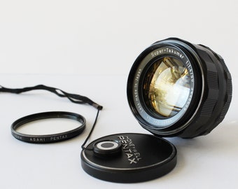 Pentax SUPER-TAKUMAR 50mm f/1.4 7 Element Version with M42 Mount with original cap and UV filter - needs cleaning!