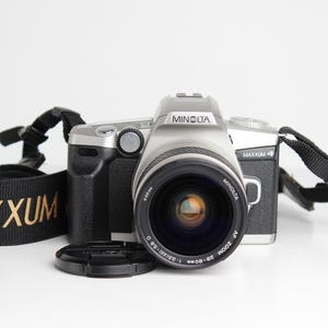 MINOLTA Maxxum 4  35mm Film SLR AF Camera with Minolta 28-80mm Zoom Lens - Works great! - Batteries Included