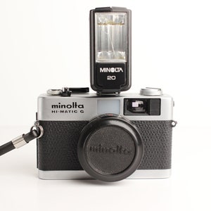MINOLTA HI-MATIC G with Rokkor f/2.8 38mm Lens and Flash - Works