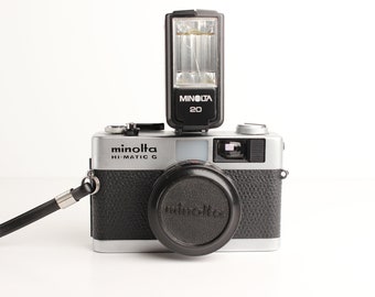 MINOLTA HI-MATIC G with Rokkor f/2.8 38mm Lens and Flash - Works