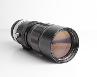 SOLIGOR 75-260mm f/4.5 Auto-Zoom Lens for MINOLTA with built-in lens hood