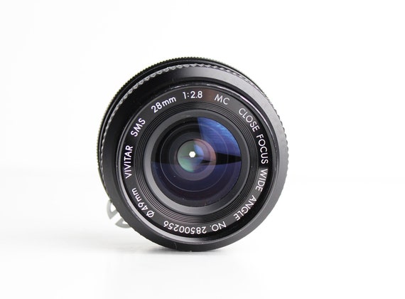 Vivitar SMS Close Focus Wide Angle 28mm F/2.8 MC Lens With Vivitar SMS Close Focus Wide Angle 28mm F/2.8 MC Lens With