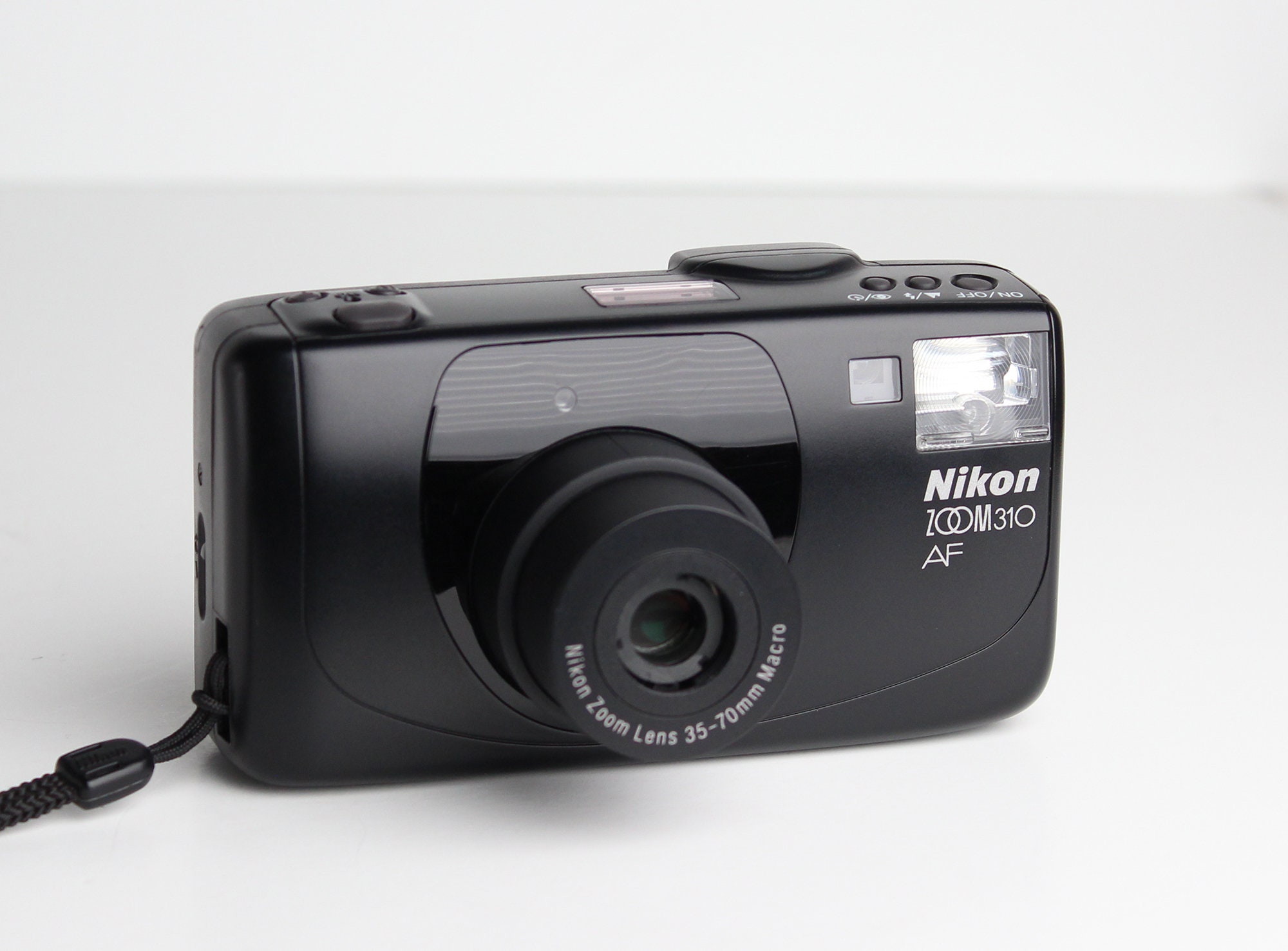 Nikon ZOOM 310 AF 35mm Point-and-Shoot Film Camera with 35-70mm Nikon Zoom  Lens Macro Works Battery Included