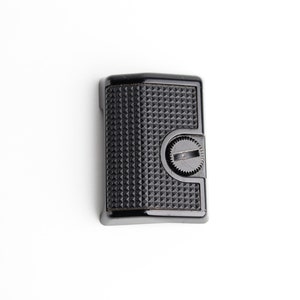 May include: A black camera accessory with a textured, geometric pattern. It has a circular dial and a rectangular shape. The accessory is set against a white background.