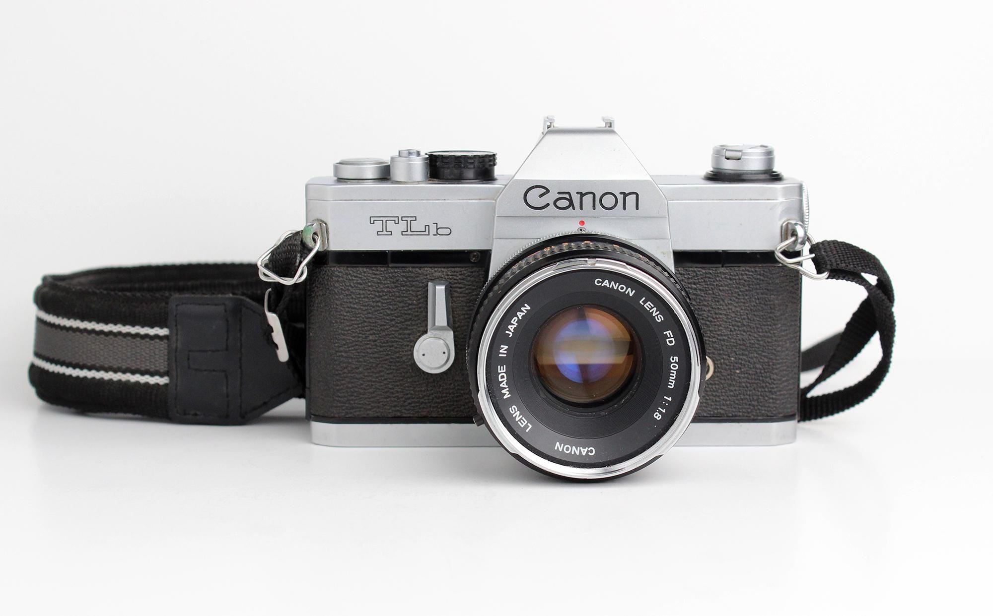 Canon AV-1 + FD 50mm F/1.8 – Étui – Testé, état Collection – Japon