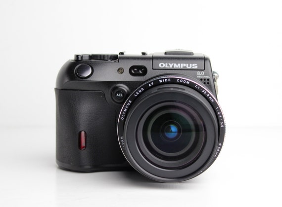 OLYMPUS CAMEDIA C-8080 Wide Zoom 8.0MP Digital Camera - With OLYMPUS CAMEDIA C-8080 Wide Zoom 8.0MP Digital Camera - With