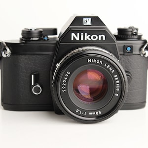 NIKON EM 35mm Film SLR Camera with Nikon E Series 50mm f/1.8 Lens - Works Great!