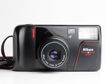 フィルムカメラ Nikon Zoom Touch 470 AF 35mm film Camera Nikon Zoom Touch 470 AF 35mm Film Camera User Manual
