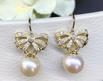 Orecchini pendenti bianchi con fiocco bianco e argento - Gioielli