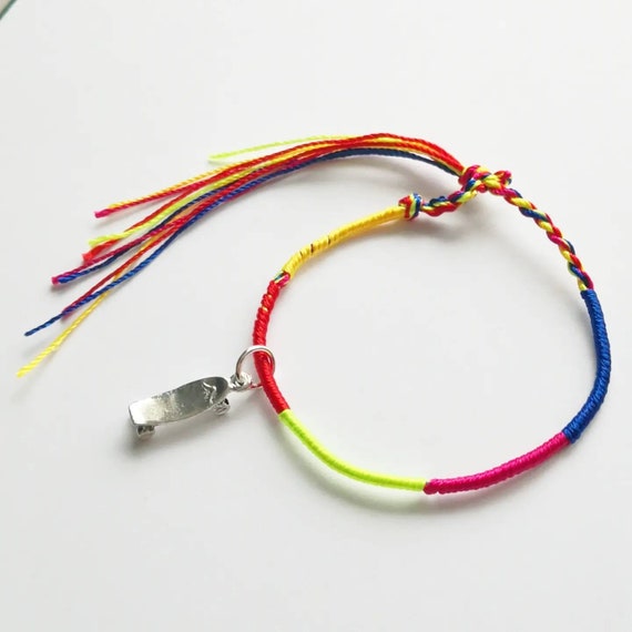 Skateboard Gift Bracelet for Skater Great Gift, small Design Charm on multicoloured rainbow cord Skateboarding Accessory
