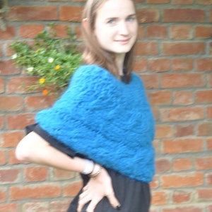 Poncho mit Zopf used Look Bild 6