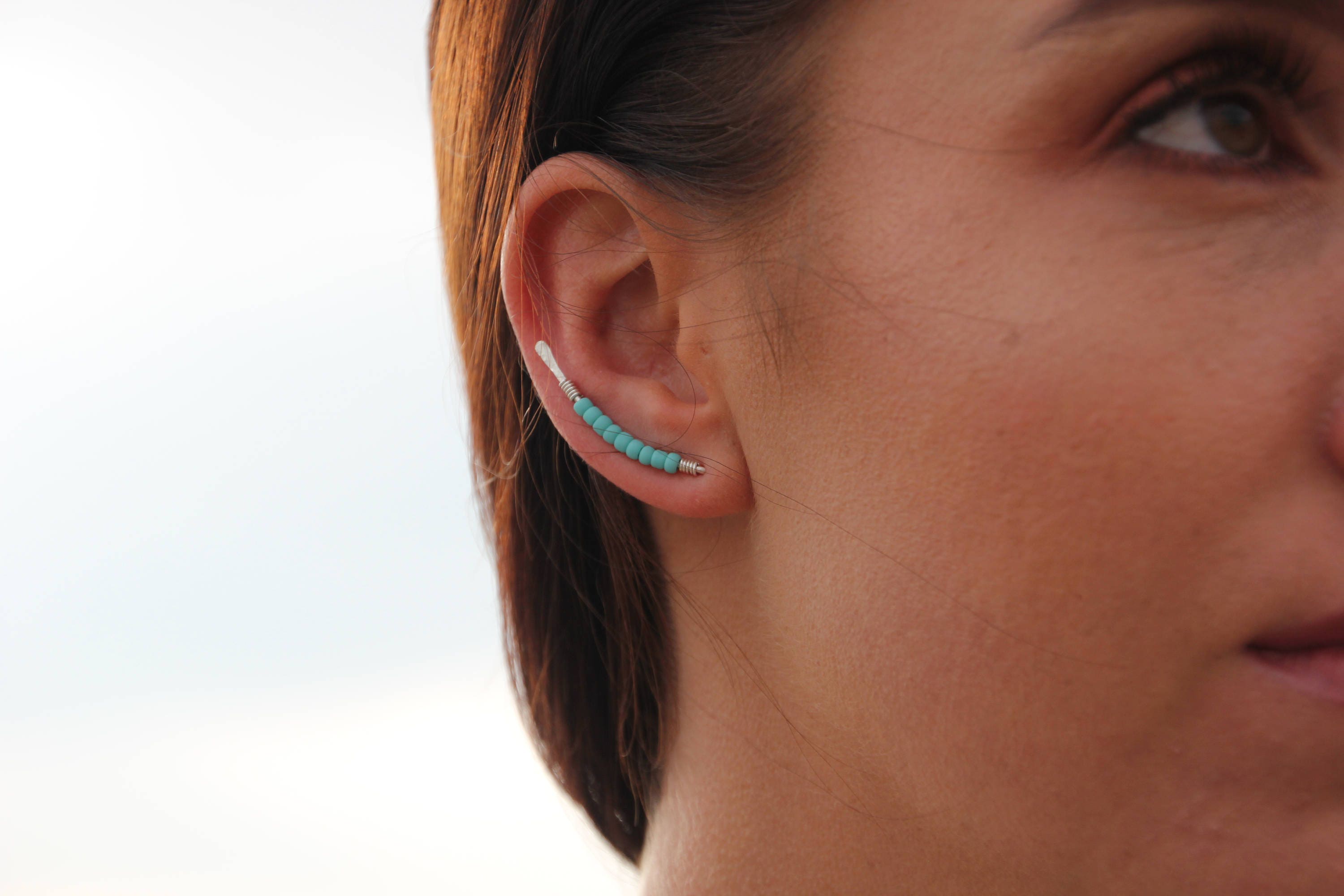 Turquoise ear deals crawler