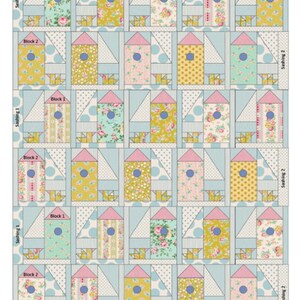 May include: A patchwork quilt with a repeating birdhouse design. Each birdhouse has a pink roof and a blue circle, filled with floral or dotted fabric. The background is light blue with white polka dots and triangles.