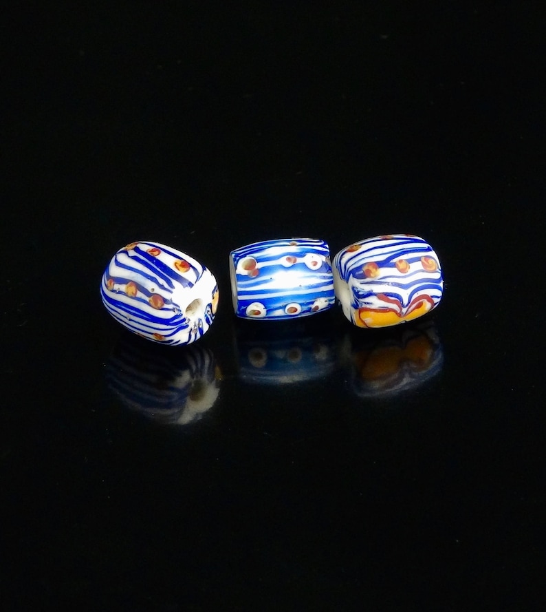 V 055 Three very pretty antique Venetian fancy beads