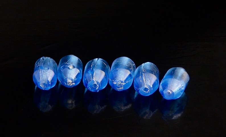 Six antique Czech beads V 374