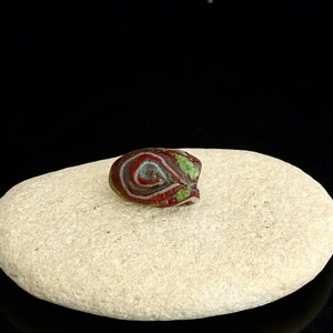 Old Islamic folded glass bead: IS 86