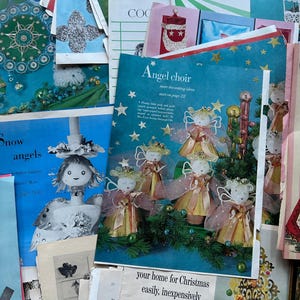 May include: A collection of vintage Christmas craft and decorating ideas, including a page with instructions for making angel ornaments, a page with a Hallmark logo and the text "your home for Christmas easily, inexpensively", and a page with a blue background and the text "Angel choir more decorating ideas start on page 22".