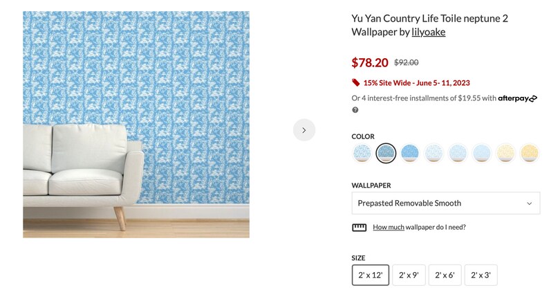 May include: Blue and white patterned wallpaper with a prepasted removable smooth finish. The wallpaper is shown in a room with a white sofa. The wallpaper is available in a variety of sizes, including 2' x 12', 2' x 9', 2' x 6', and 2' x 3'.