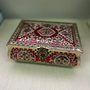 May include: A rustic wooden sign with the text "Welcome to our home" in white lettering. The sign features a distressed finish and a simple, inviting design, perfect for a front porch or entryway.