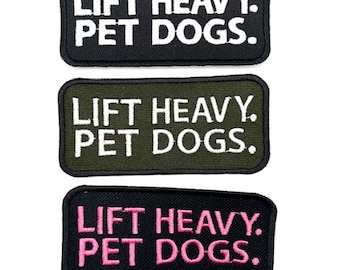 May include: Three black fabric patches with white, green, and pink embroidery. Each patch reads "LIFT HEAVY. PET DOGS."