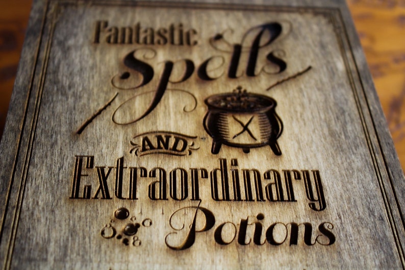 May include: A wooden box with the text "Fantastic Spells and Extraordinary Potions" burned into the surface. The box has a rustic, aged look.