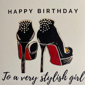 May include: Happy Birthday to a very stylish girl card with a black and white illustration of two high-heeled shoes with red soles.