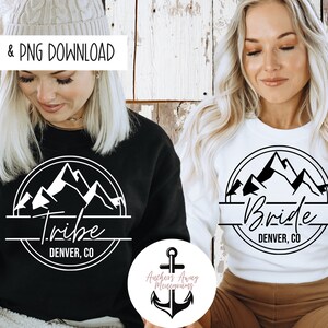May include: Two black and white mountain range designs on white and black shirts. The design on the white shirt says "Bride Denver, CO". The design on the black shirt says "Tribe Denver, CO".