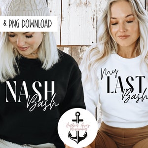 May include: Two women wearing black and white sweatshirts with the text "NASH Bash" and "My LAST Bash" on them. The women are standing in front of a wooden background.
