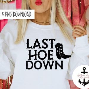 May include: White sweatshirt with the text "LAST HOE DOWN" in black, featuring a cowboy boot graphic. The top also has the text "SVG & PNG DOWNLOAD" in the upper left corner and a logo in the lower right corner.