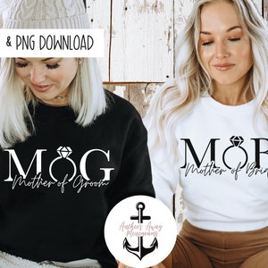 May include: Two white sweatshirts with black text and a diamond ring graphic. The text on the left sweatshirt reads "MOG Mother of Groom". The text on the right sweatshirt reads "MOB Mother of Bride".