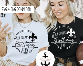 May include: Two white t-shirts with black text and a fleur-de-lis design. One shirt says "New Orleans Birthday Crew" and the other says "New Orleans Birthday Babe".