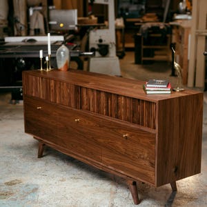 Handcrafted Walnut Storage Cabinet with Miter Joinery, Continuous Grain Drawer Fronts, Brass hardware, textured sliding doors, hand finished