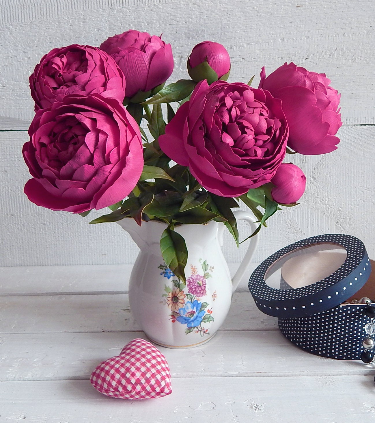 Pink artificial flowers in vase deals