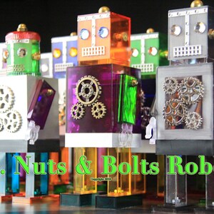 Plakat Mr. Nuts & Bolts Robots przedstawiający grupę jasnych i błyszczących robotów! To zdjęcie pochodzi ze strony głównej RobotShack