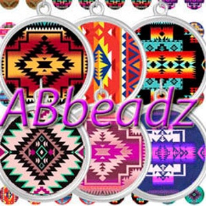 May include: Six circular silver-toned pendants featuring vibrant geometric patterns in shades of red, orange, yellow, black, pink, and blue. Each pendant has a small metal loop at the top. The word ABBEADZ is written in large purple letters across the center.