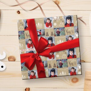 May include: A brown and beige gift wrap with a red ribbon. The wrap features a collage of photos of a young boy, along with Christmas-themed text and images, including "Believe", "Merry", and "Joy".