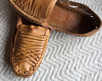 native flat slip ons with woven leather strips