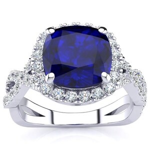 14 Karat White Gold  3 1/2 Carat Cushion Cut Sapphire and Halo Diamond Ring With Fancy Band
