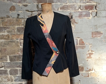 1980s womens black jacket,  print on border.