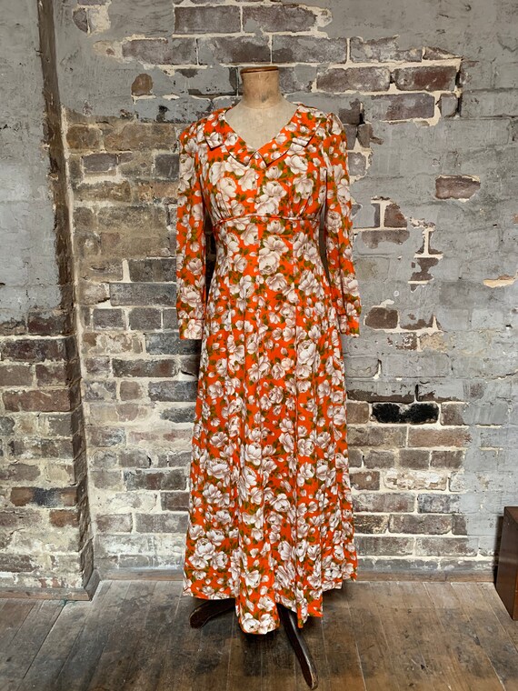 1970s orange floral floor length dress.