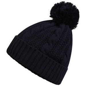 wooly hat with a peak