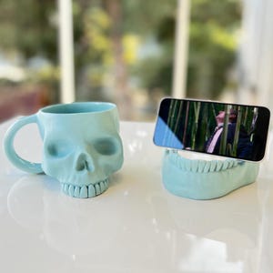 Pastel Blue Skull Mug & Phone Holder Set – Handmade Ceramic Bundle, Gothic Cute Gift, Horror Office Decor, Unique Skull Pottery