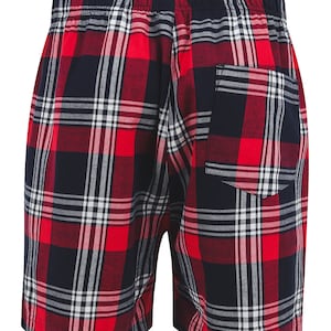 May include: Red and navy blue plaid shorts with a back pocket.