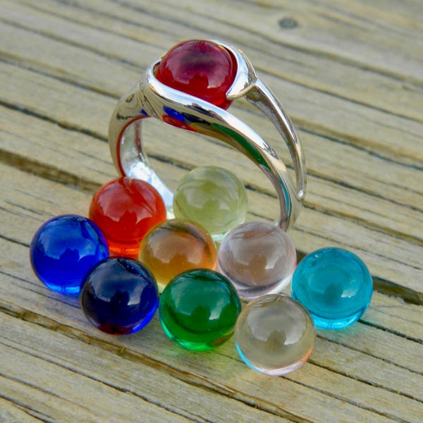 Interchangeable ring with 10 - 8mm glass stones